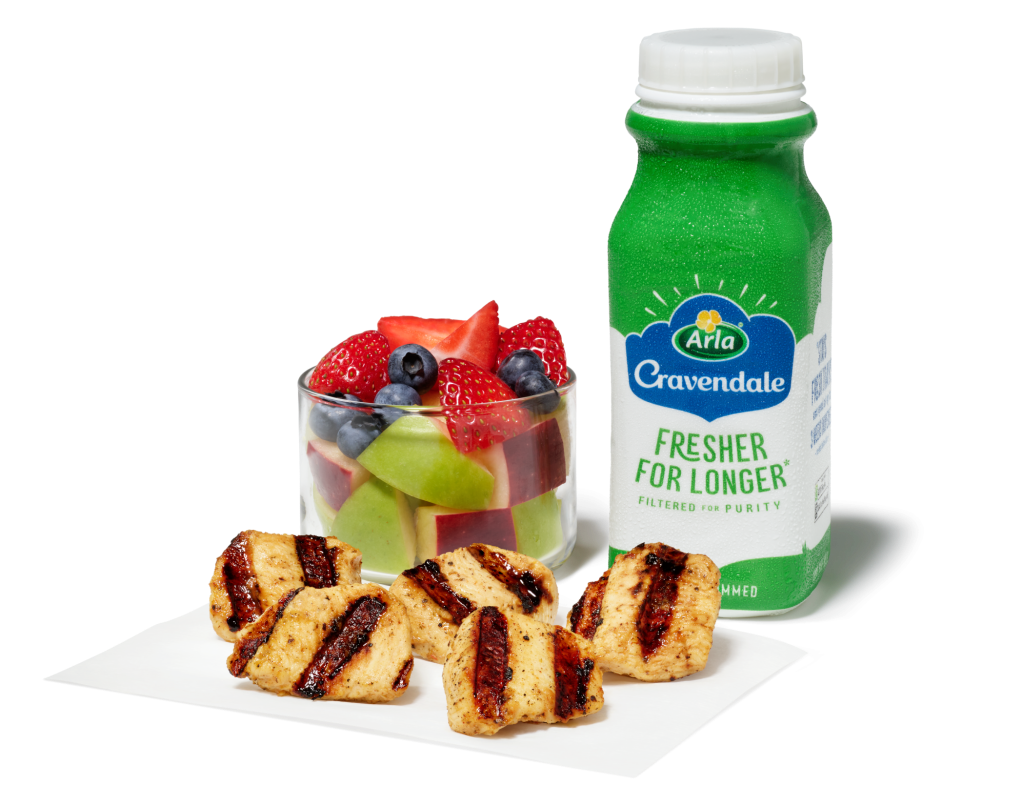 Kid's meal of grilled nuggets, fruit cup and bottle of organic milk
